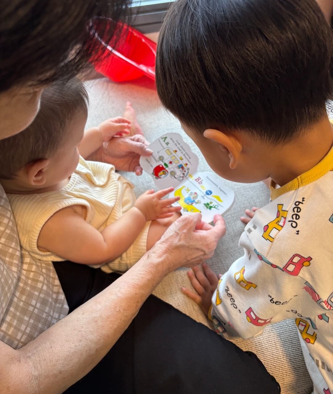 My kids reading an alphabet book